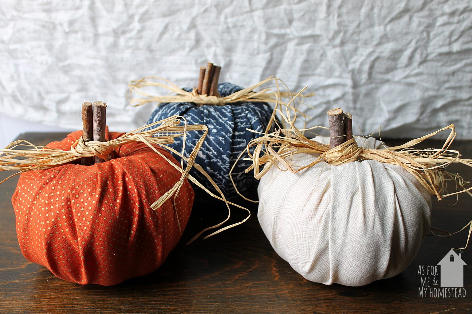In just 10 minutes, you can have adorable fall decor!  Quick, easy, and affordable Fabric Pumpkins are the perfect fall craft.