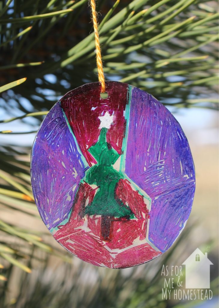 Making shrinky dinks is always a fun experiment!  And these Recycled Shrinky Dink Ornaments are such a cute way to give a piece of your child's art as a gift!